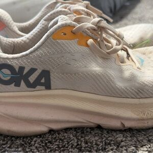 Hoka Cream and Yellow Athletic Shoes